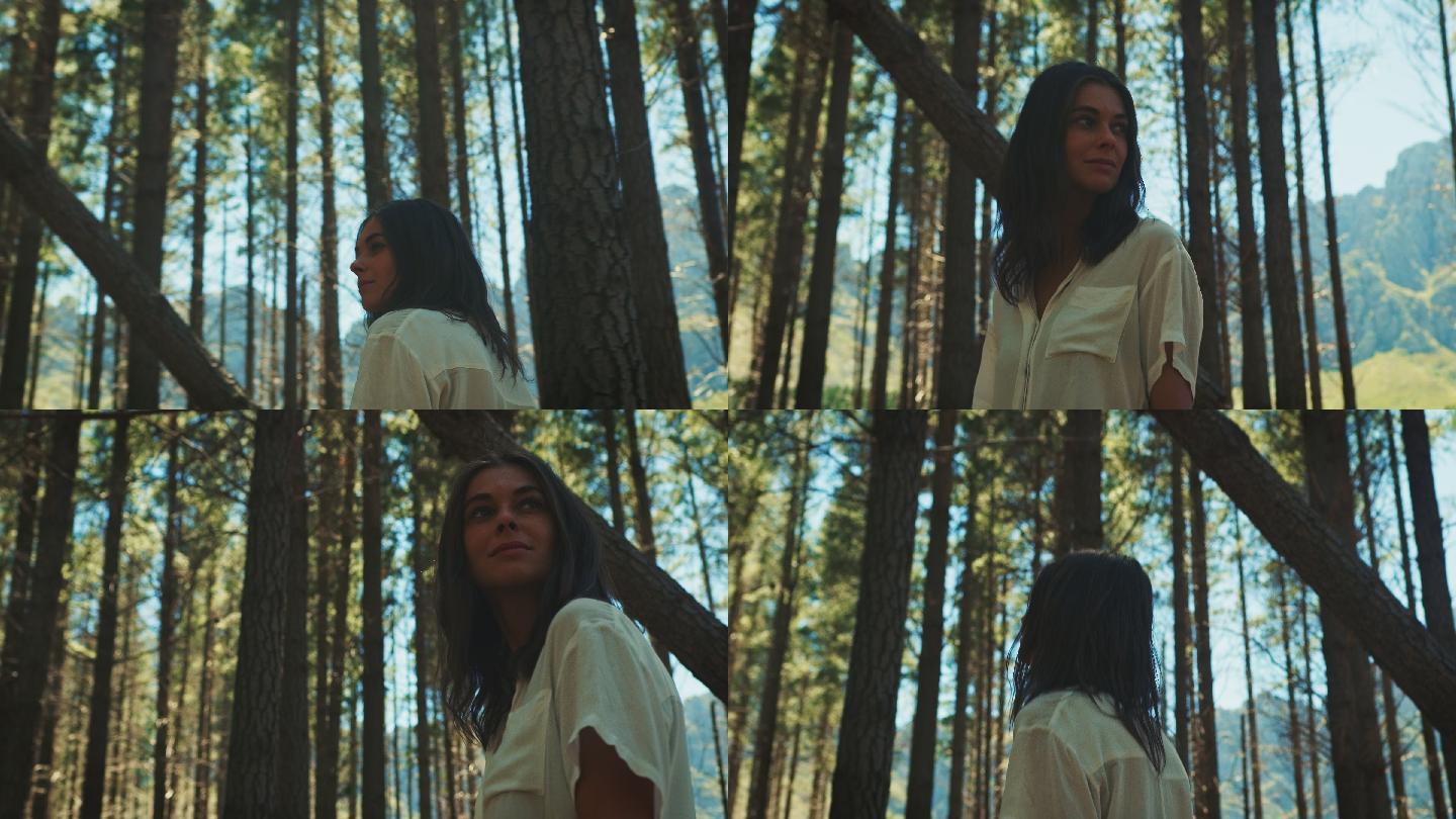 穿过森林的女人美女森林徒步追寻放空
