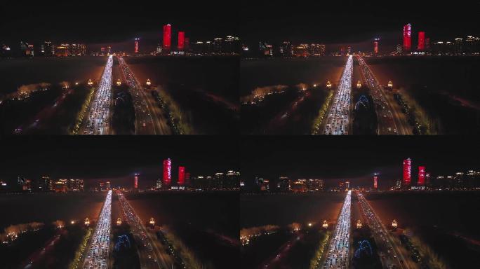 夜幕下的哈尔滨松花江公路大桥车流如织2