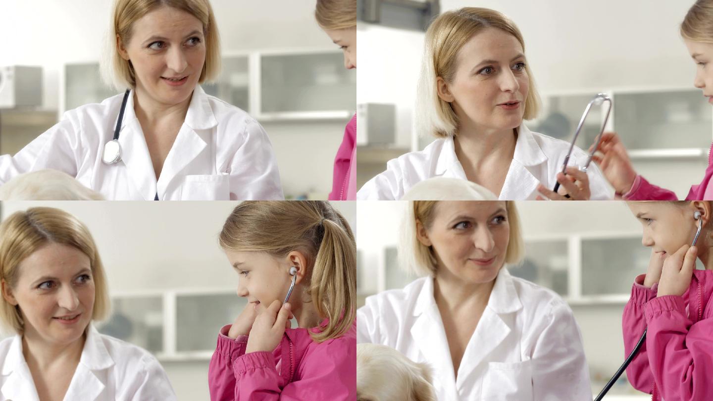 小女孩给小女孩用听诊器听狗的内部声音