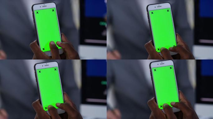 商人使用绿屏手机iPhone苹果手机绿幕