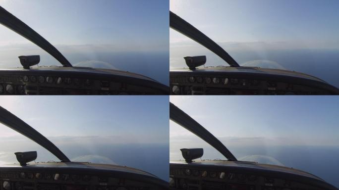 小型飞机的驾驶舱视角蓝天白云