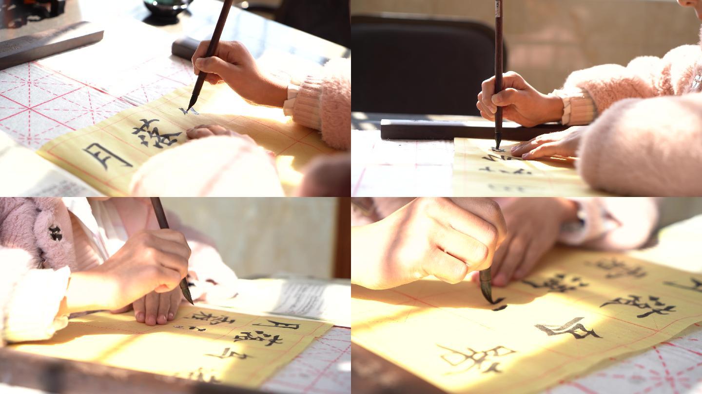 实拍小女孩在房间写毛笔字