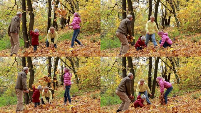 爷爷奶奶和孩子们在秋季公园玩得很开心