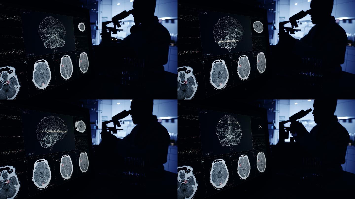 科学家与显微镜。计算机屏幕上的脑电波扫描研究