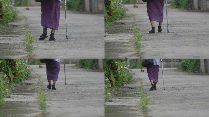 走在街上的老妇人拄拐杖老奶奶背影老太太往