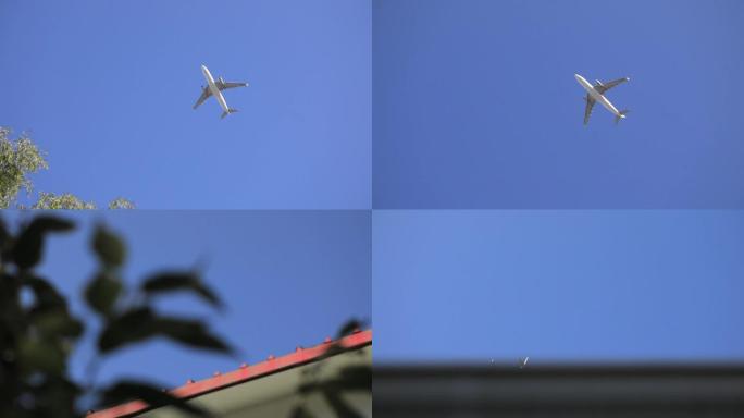 飞机飞过天空，飞过屋檐