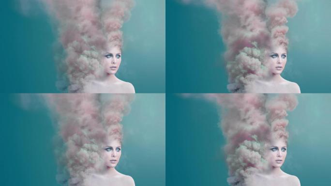 一个女人在蓝色背景中化为烟雾