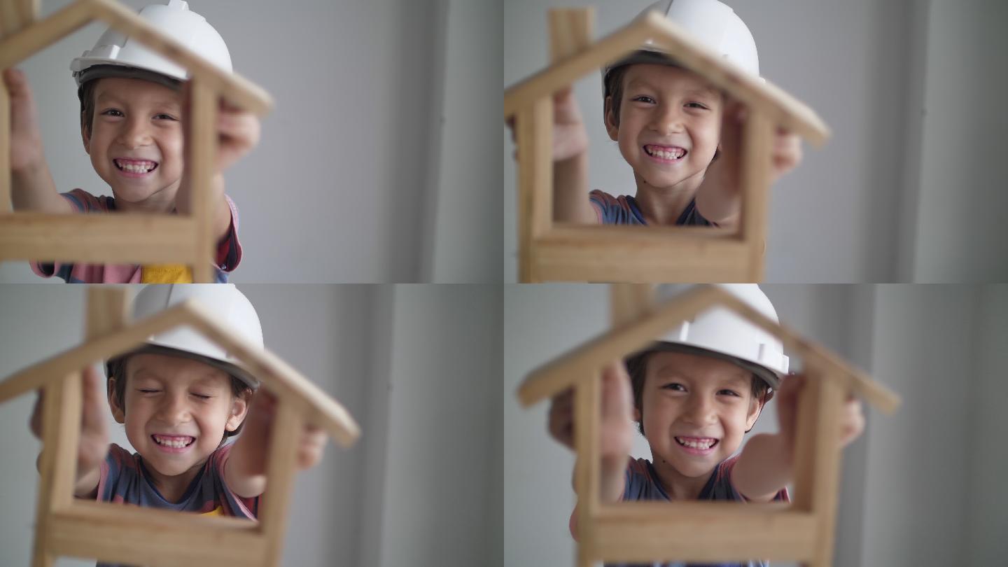 戴安全帽的小男孩肖像：工程师概念