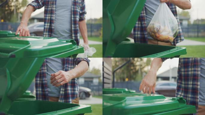 男性将生物食物垃圾扔进绿色垃圾桶