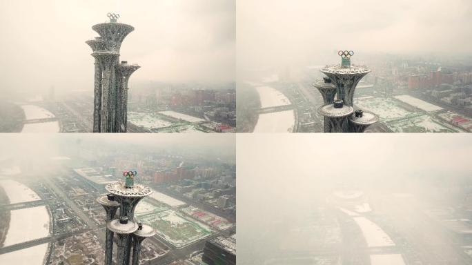 4k航拍北京奥林匹克公园鸟巢飞雪横向2
