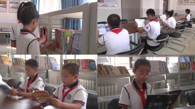 小学生在校园图书馆里找书看书