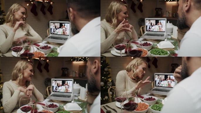 一对情侣在圣诞节视频通话中交谈