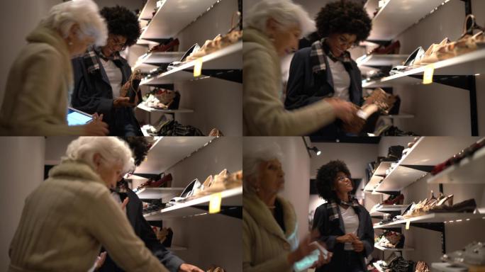 女子在商店买鞋时一名女售货员的帮助她