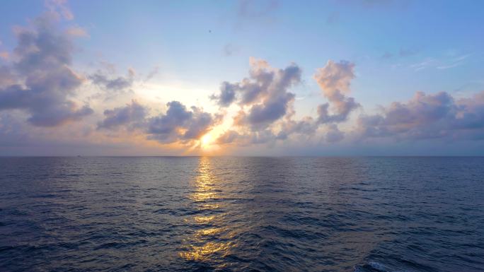 大海日出夕阳白云云彩唯美的海面