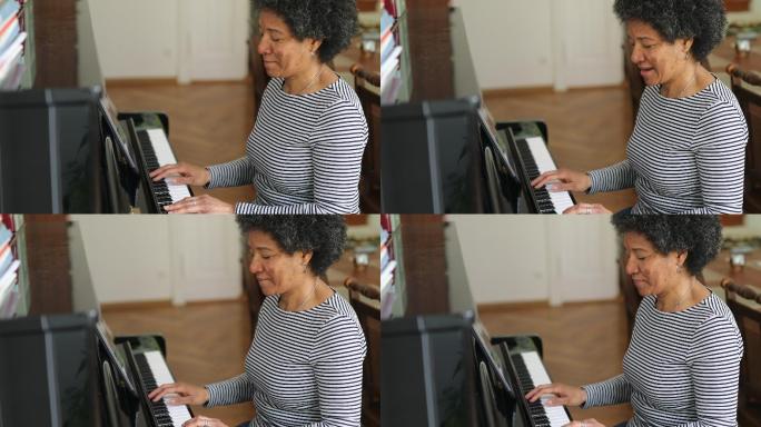 COVID-19大流行期间在家学习弹钢琴的女性