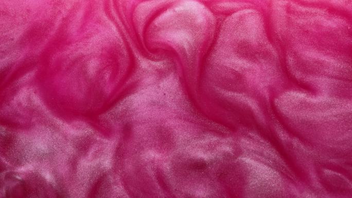 闪光颜料纹理背景粉红色流体运动