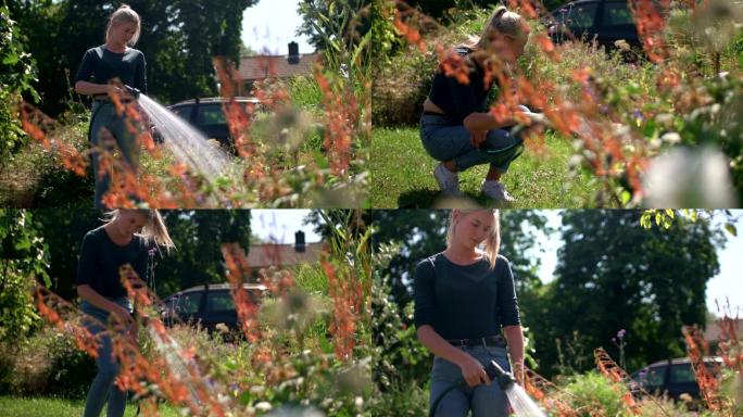 一个年轻女子在郊区一所房子的院子浇花