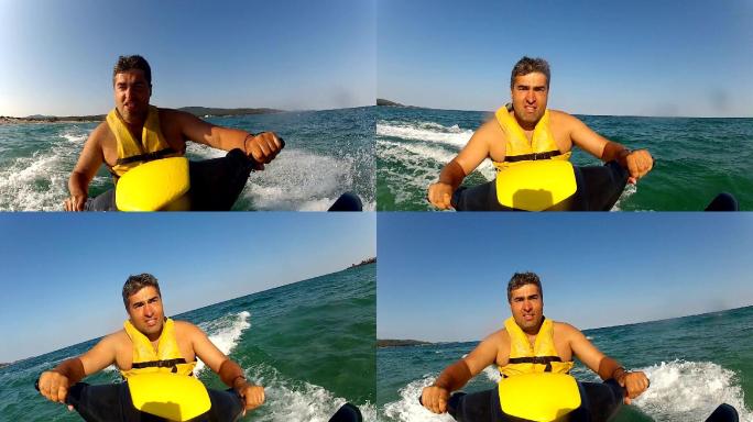 男子在海洋上骑着水上运动摩托艇