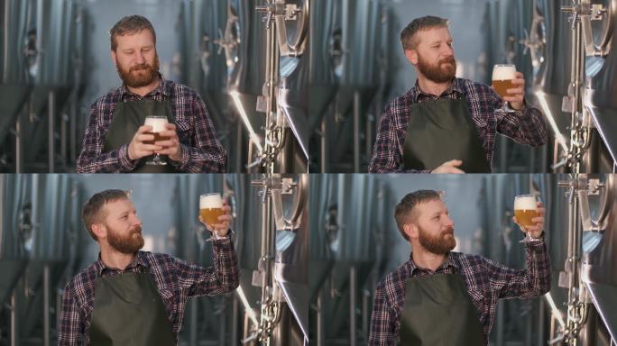 男酿酒师检查啤酒罐中新酿啤酒的颜色