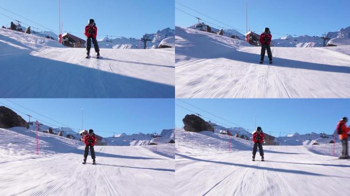 滑雪度假村的年轻滑雪者滑雪