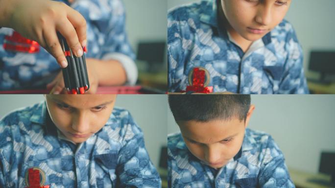 少年男孩学习并修复计算机的硬件问题。