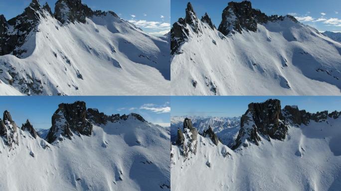 无人机俯瞰积雪覆盖的高山山脊