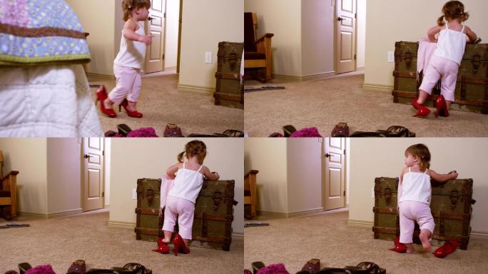 可爱的小女孩试穿妈妈的鞋子