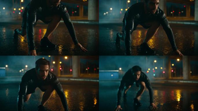 一个年轻人在一个下雨的晚上开始短跑。