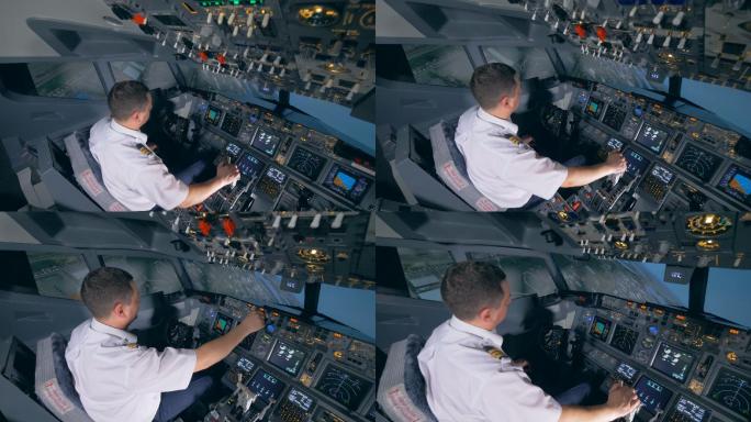 飞行教员正在使用飞行模拟器执行下降操作