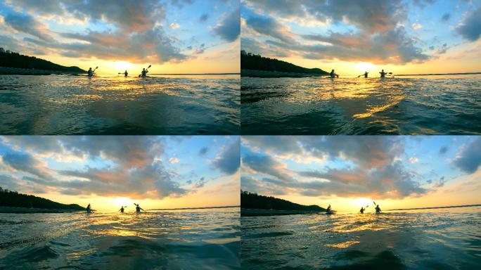 海面上划船的人大海海水海中皮划艇小船夕阳