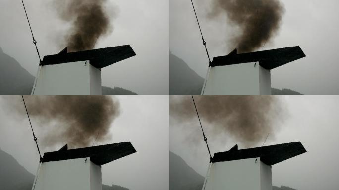 从船上的管道向外释放黑烟到空气中，污染了空气