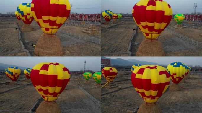 航拍太原稻田公园热气球红色旋转上升