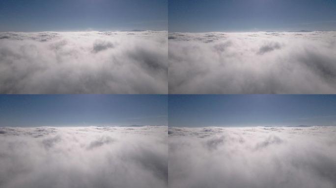 飞越山脊正上方的云海。