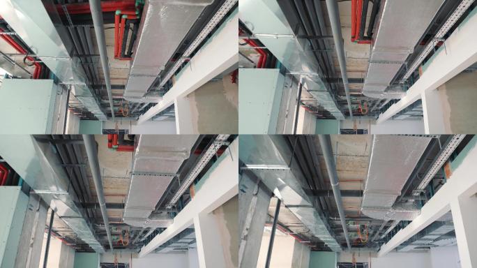 建筑物走廊天花板上的管道和通风。