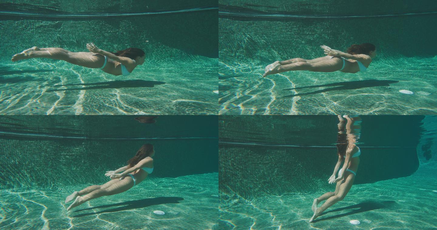 度假游泳的美女潜水潜泳少女婀娜身材比基尼