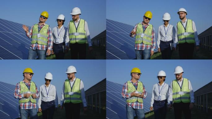 三名电气工人检查太阳能电池板