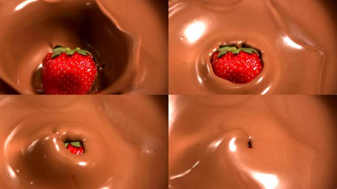 草莓落入融化的巧克力中