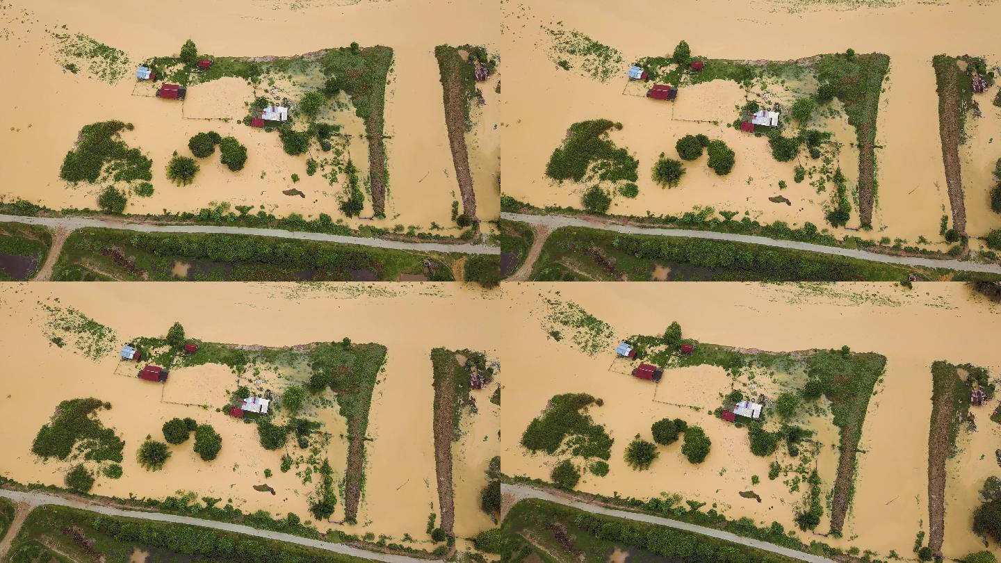 马来西亚农村地区木屋洪水鸟瞰图。