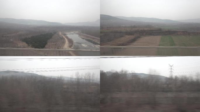 火车高铁动车窗外风景铁路边小麦山丘山区