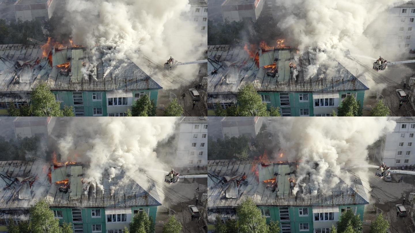 一栋住宅高层建筑的屋顶正在燃烧