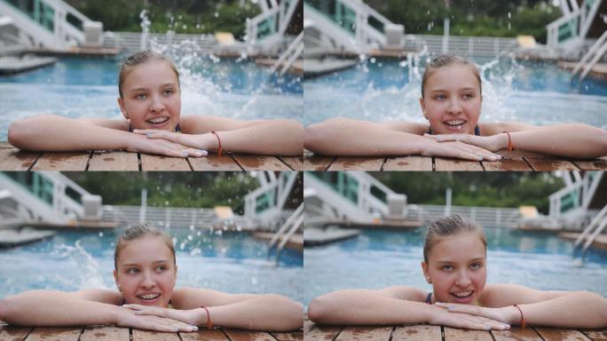 一个微笑的少女在泳池边特写。