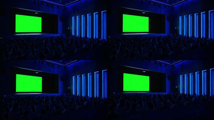 观众们在绿色模拟屏幕上观看新的大片