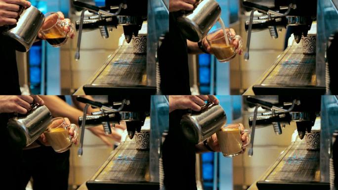 咖啡师在繁忙的咖啡店用咖啡机煮咖啡