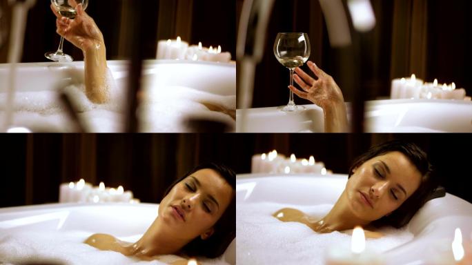 在泡澡的女人沐浴性感红酒浴缸浪漫性感