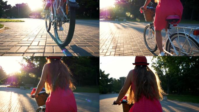 年轻迷人的女孩骑着复古自行车