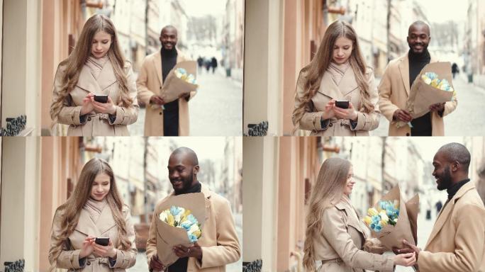 男子在街上用鲜花给女朋友惊喜