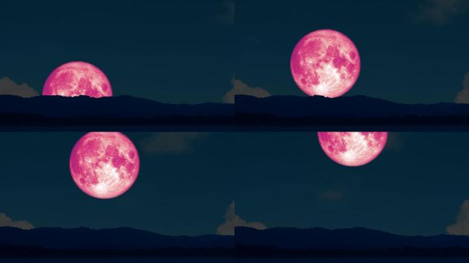 粉色月亮升起在夜空中