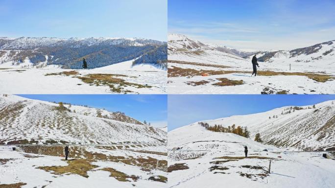 航拍情侣在雪山奔跑戏耍打闹骑大马