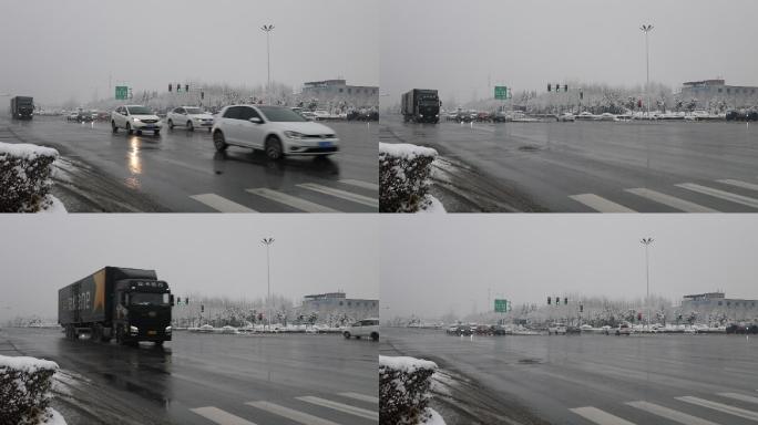 路面湿滑下雪天气雨雪马路繁忙的城市开车