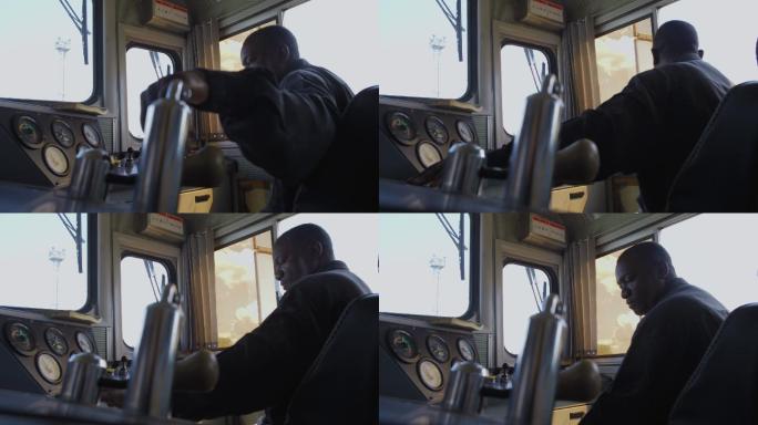 非洲坦赞铁路上开火车的司机